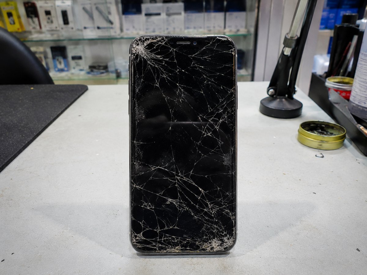 The same phone as it came in, with a cracked screen